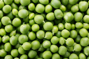 Heap of fresh green peas close up