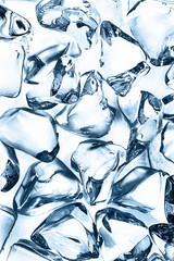background of blue ice cubes, top view