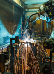 Welding Robot movement in a car factory