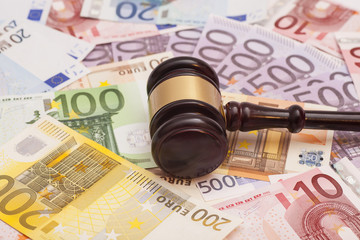 Judge gavel and euro banknotes