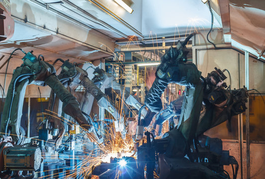 The robot welding in an auto parts factory.