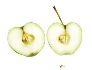 two halves of a green apple