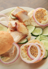 Making pork belly sandwiches