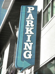 Obraz premium aged and worn vintage parking sign