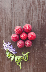Fresh raspberries on a wooden table