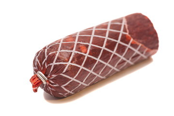 Half of smoked sausage stick isolated on white background