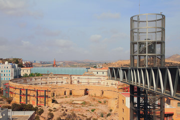 Ruins of ancient arena and modern elevator. Cartagena, Spain