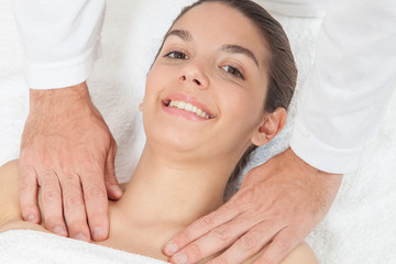 Fototapeta na wymiar Pretty woman getting massage