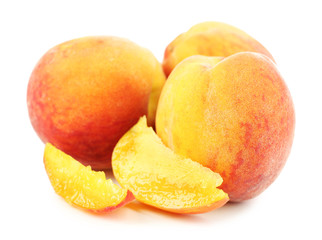 Ripe peaches isolated on white