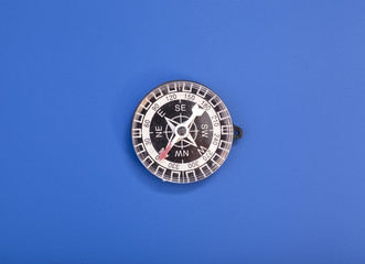 Compass on  blue background