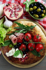 Ingredients of Mediterranean cuisine, on wooden board, close-up