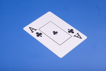 Ace of Clubs on blue background