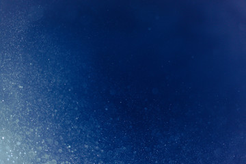 abstract dark bokeh lights background ,  defocused background, glowing galaxy