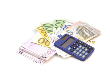 Calculator with euro bank notes isolated on white