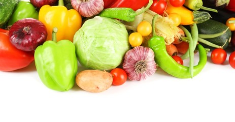 Heap of fresh vegetables isolated on white
