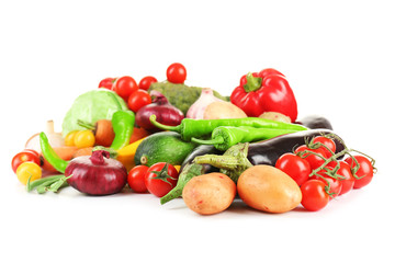 Heap of fresh vegetables isolated on white