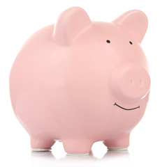 Pink ceramic piggy bank isolated on white