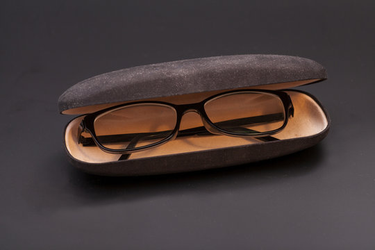 Eyeglasses And Eyeglasses Case In A Black Background