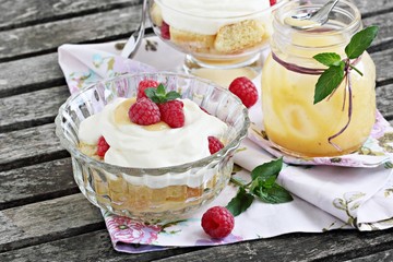 Raspberry trifle with mascarpone cream and lemon curd.Selective focus. 