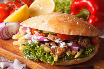 Doner kebab with meat and vegetables closeup. horizontal
