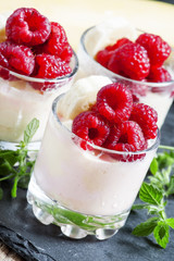 Ice cream with banana and raspberry, selective focus