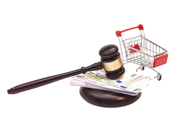 Hammer of judge, pushcart and euro money isolated on white backg