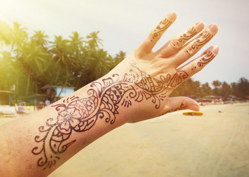 Henna tattoo on the arm. Palolem beach of South Goa, India