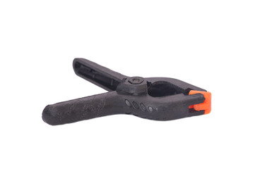 Obraz premium Black Plastic Spring Clamps isolated on white background