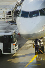 Fototapeta na wymiar Passenger aircraft maintenance before flight at airport.