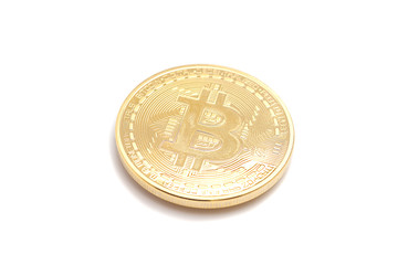 Golden Bitcoin coin isolated on white
