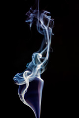 Colorful smoke abstract on black background
