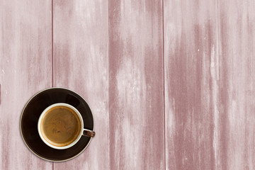 Coffee on old wood wall background.