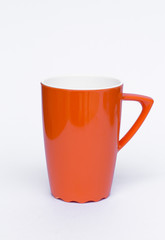 Glass of orange plastic