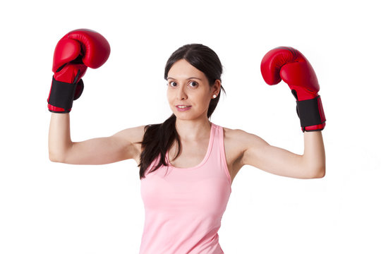 Victorious girl with boxing gloves