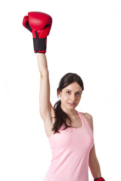 Victorious girl with boxing gloves