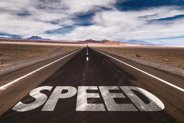 Speed written on desert road