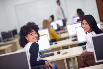 students group in computer lab classroom