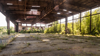 OLD ABANDONED HANGAR OF THE MILITARY AIRBASE