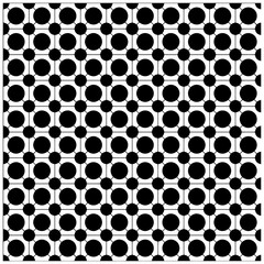 Geometric seamless circle pattern in black and white.