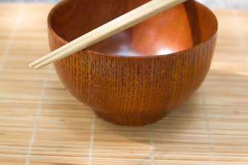 Wooden bowl and chopstick