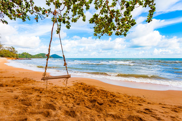 Swing on the beach and cloud at Chanthaburi, Thailand.