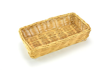 Empty wicker basket isolated on white