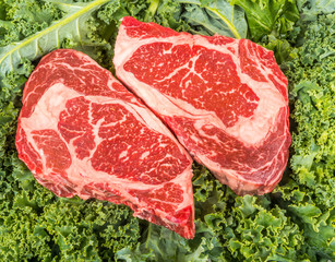 Beef rib eye on the salad leafs