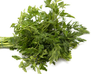 dill and parsley on a white background