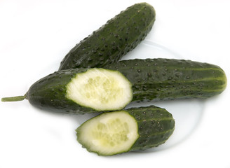 Fresh cucumbers on a white background