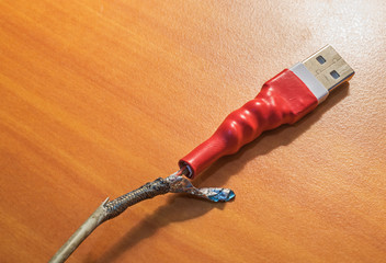 Close-up of broken usb charger cable