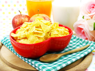 morning breakfast with fresh apple cornflake and milk selective focus