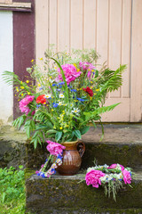 Fototapeta na wymiar Beautifull Ligo bouquet. Midsummer celebration in june.