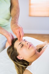 Obraz na płótnie Canvas Relaxed pregnant woman enjoying head massage