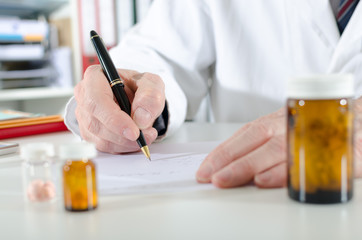 Doctor writing prescription